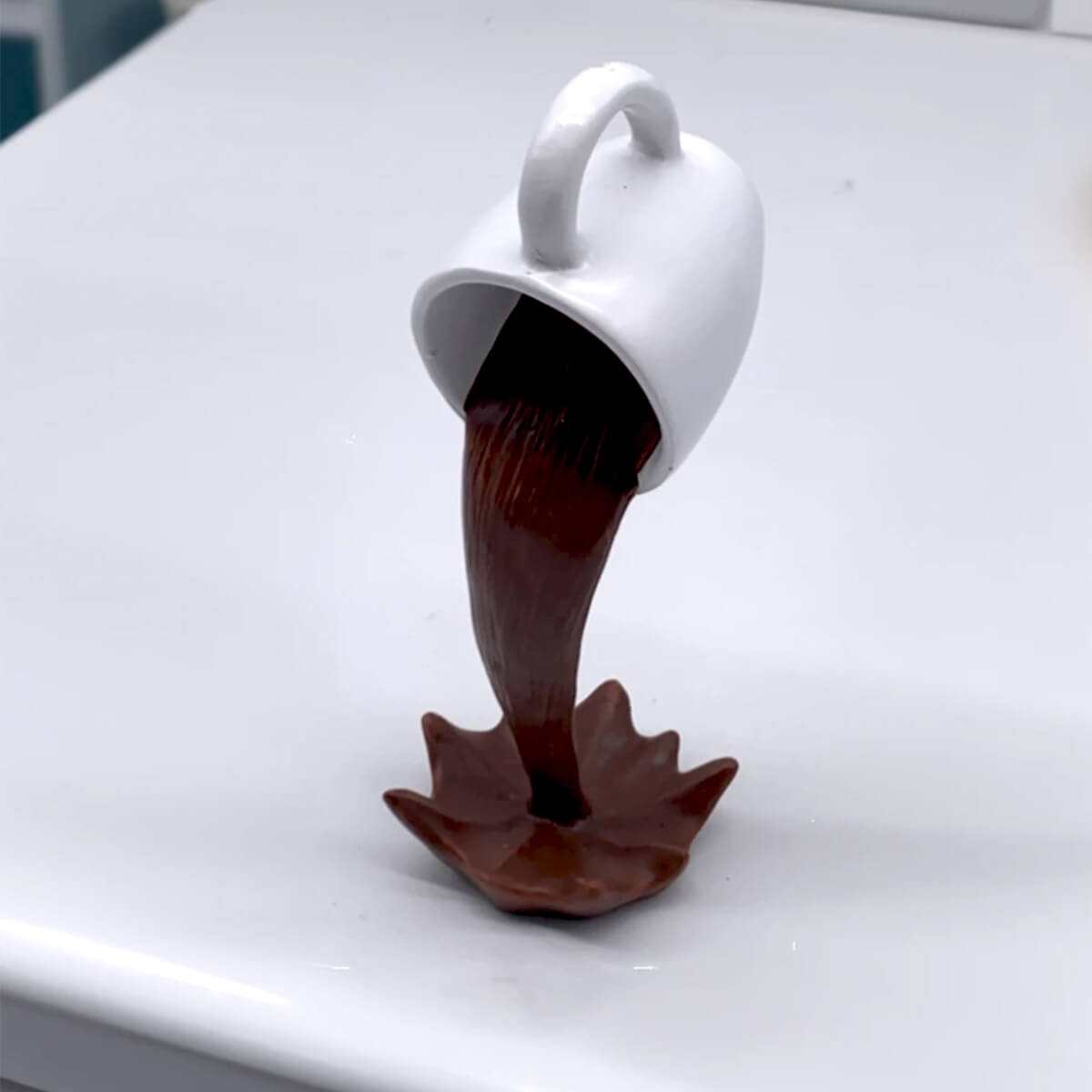 Floating Spilling Coffee Cup